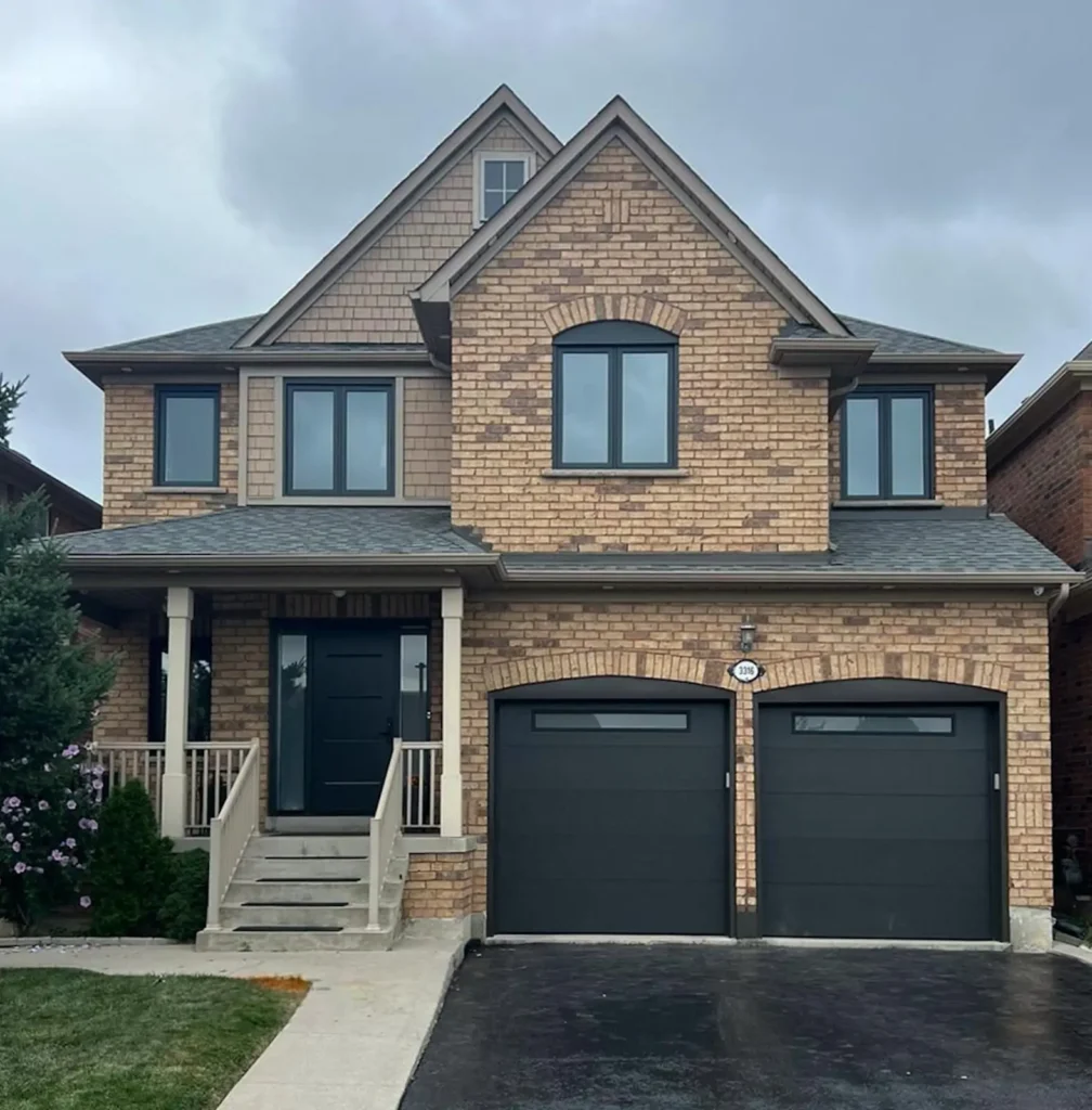 Flush-panel-dark-brown-with-top-narrow-windows-garage-doors.webp